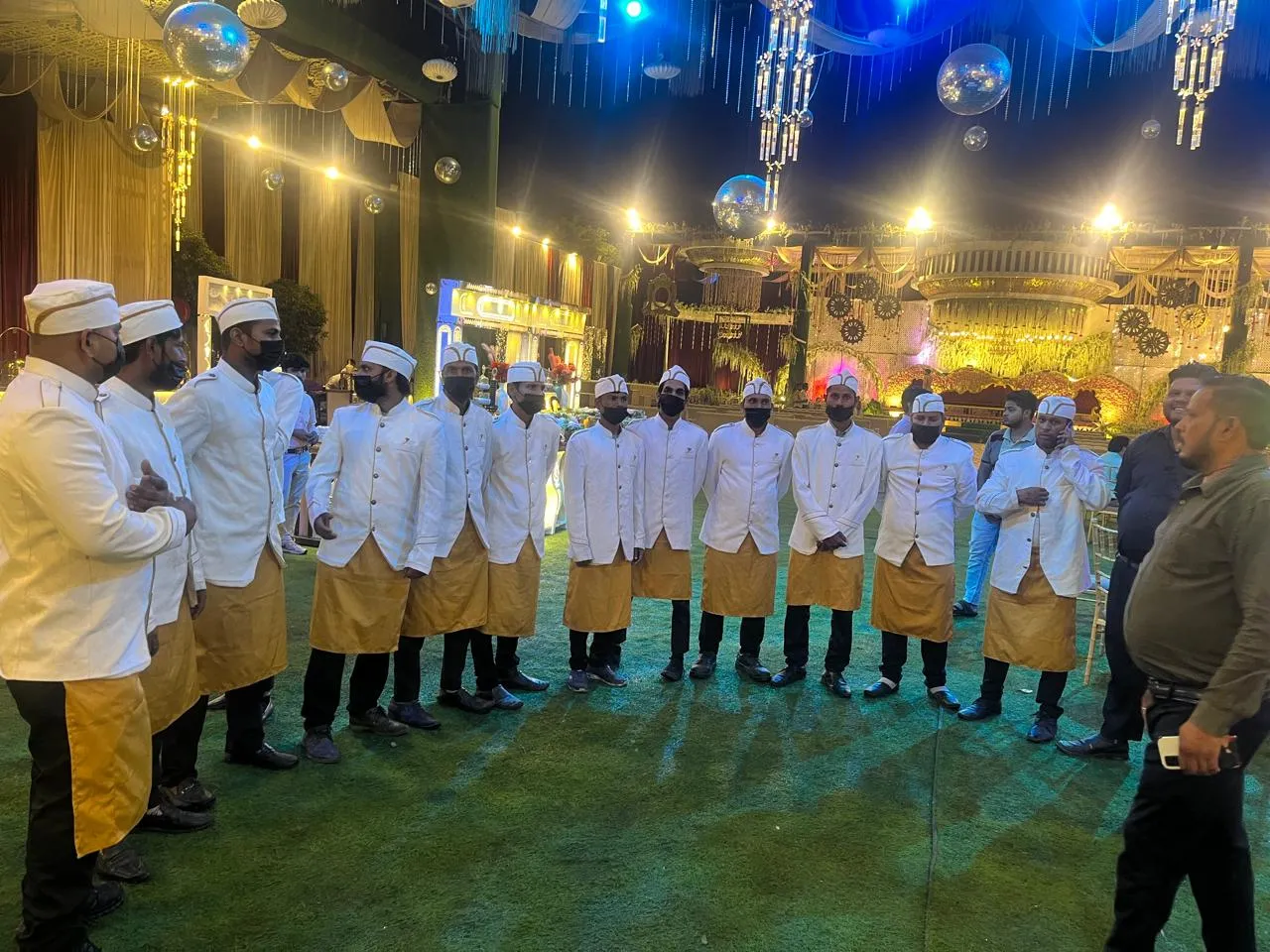 MG Caterers service team in uniform